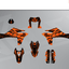 Arider Dekor passend für KTM 690 SMC-R – Glow Edition, orange-schwarze Grafikteile in flacher Einzelteilansicht.